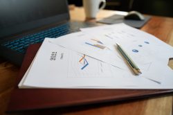 Paperwork with a pencil on top