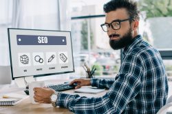 young man managing SEO